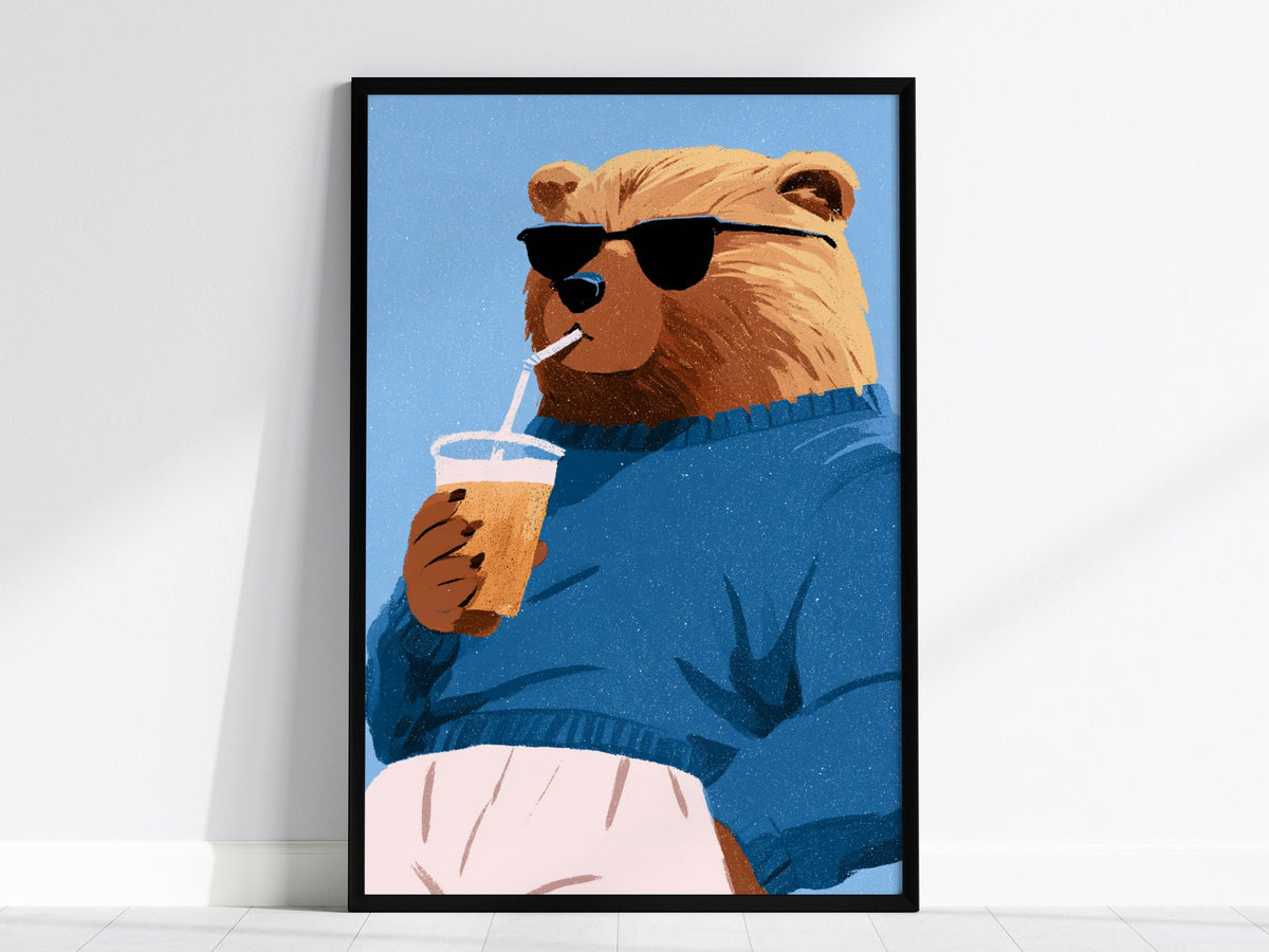Cool Bear Sips Poster | Pastel Blue Illustrative Art Print | Kids Room Wall Art — framed print on the wall, 24x36 in