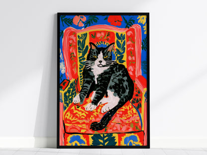 Cat Claims Chair Poster | Cobalt and Red Matisse Style Art Print | Cat Lover Wall Art — framed print on the wall, 24x36 in