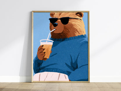 Cool Bear Sips Poster | Pastel Blue Illustrative Art Print | Kids Room Wall Art — framed print on the wall