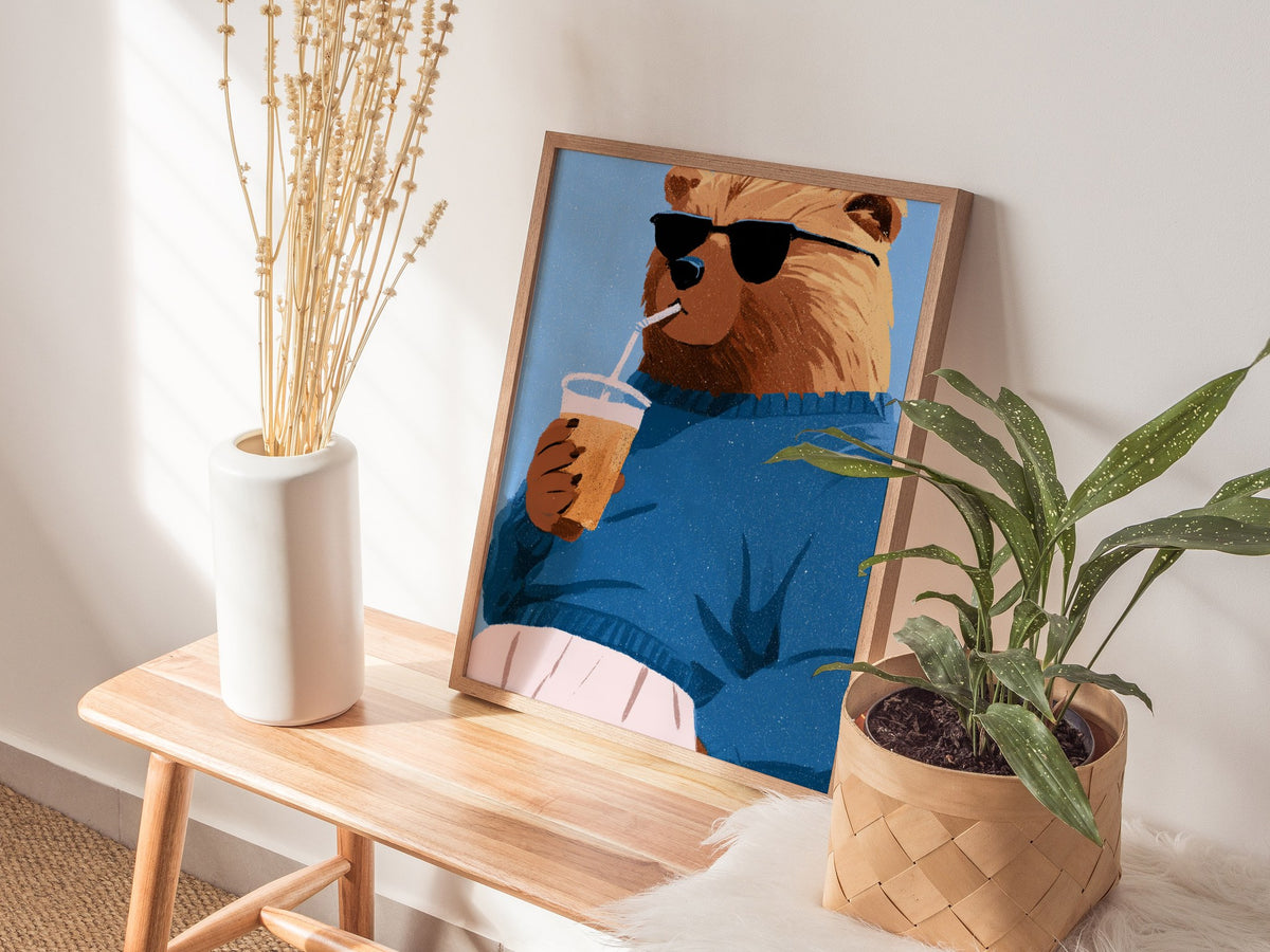 Cool Bear Sips Poster | Pastel Blue Illustrative Art Print | Kids Room Wall Art — styled in an interior