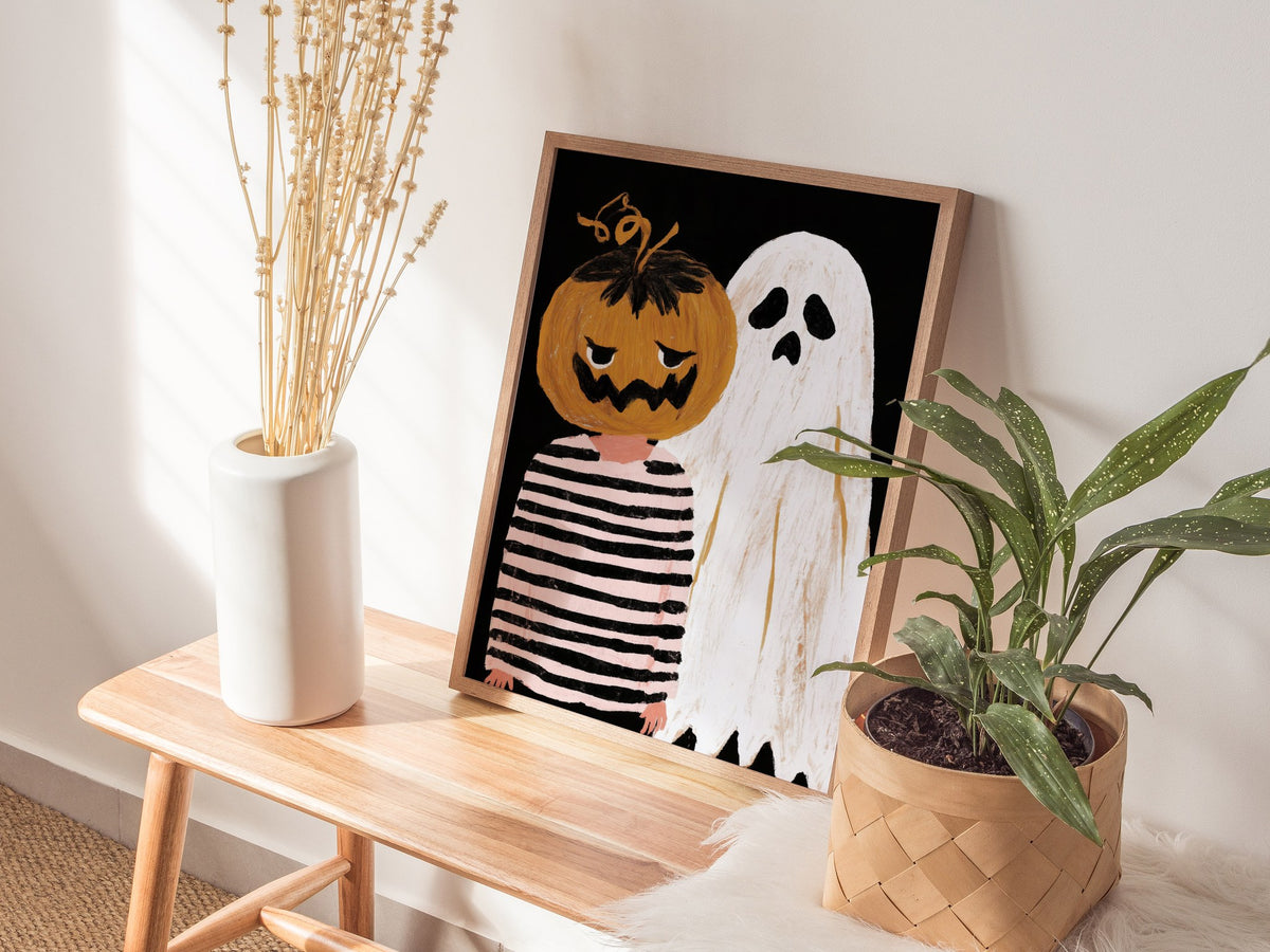 Pumpkin and Ghost Poster | Pink and Orange Illustrative Art Print | Kids Room Wall Art — styled in an interior