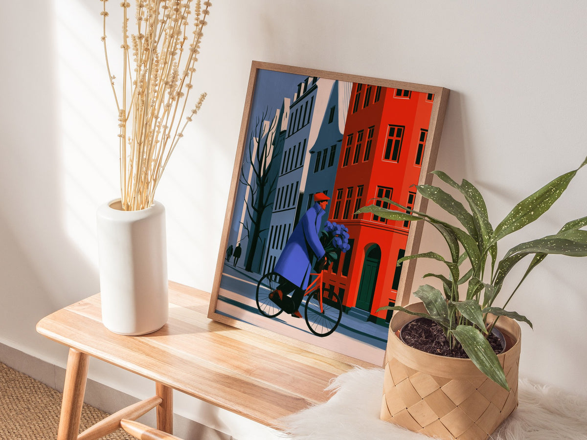 Cyclist Carries Hydrangeas Poster | Cobalt and Yellow Illustrative Art Print | Modernist Wall Art — styled in an interior