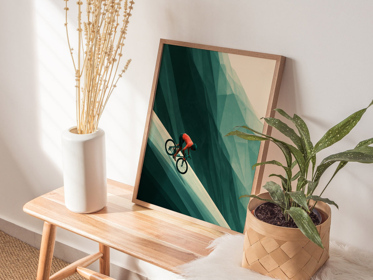 Cyclist Claims Hill Poster | Coral and Forest Low Poly Art Print | Cycling Wall Art — styled in an interior