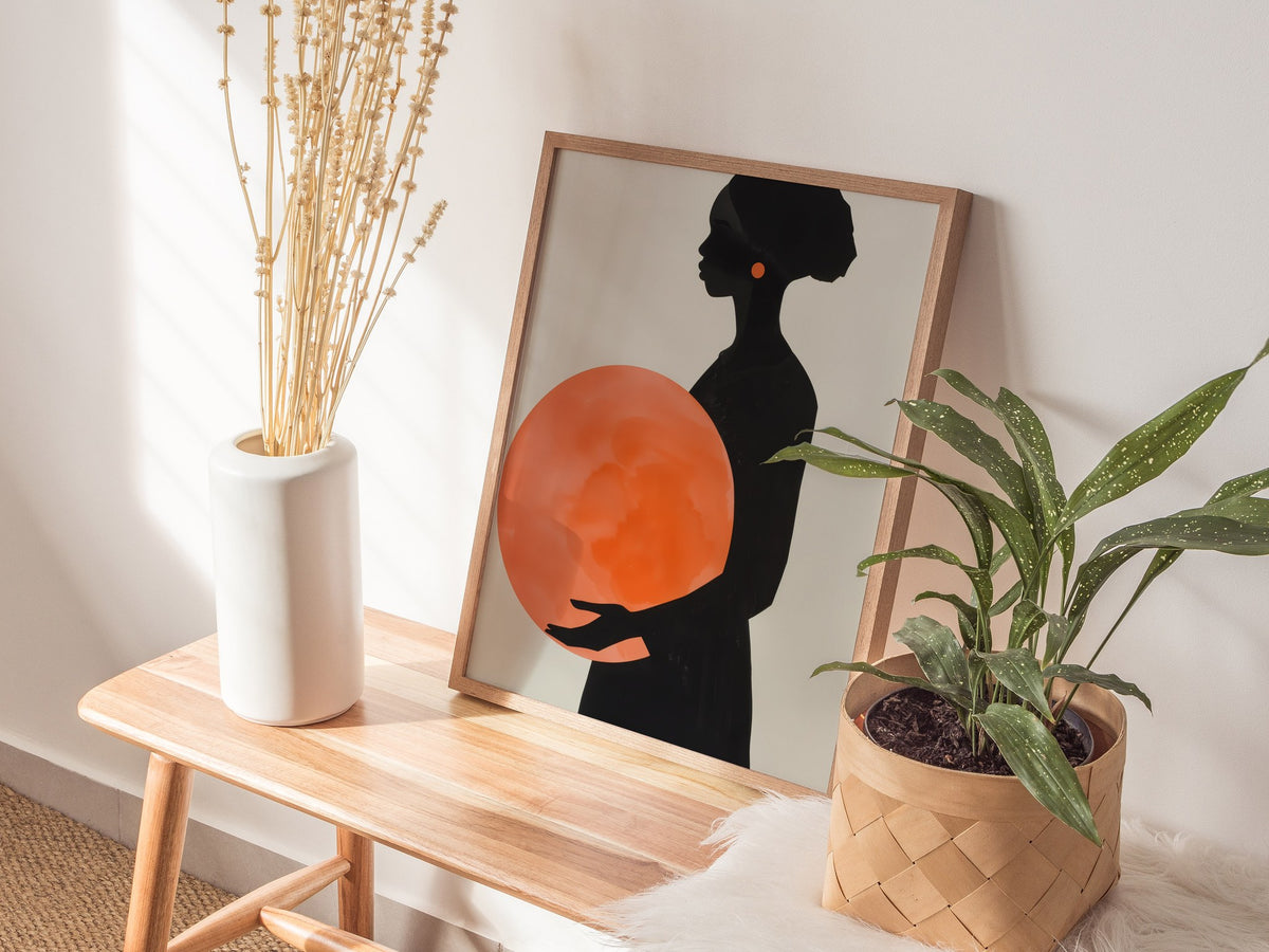 Woman with Orange Sphere Poster | Coral and Black Minimalism Art Print | Minimalist Wall Art — styled in an interior