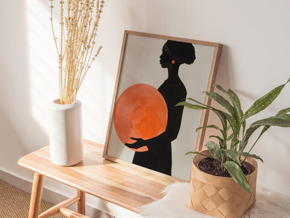 Woman with Orange Sphere Poster | Coral and Black Minimalism Art Print | Minimalist Wall Art — styled in an interior