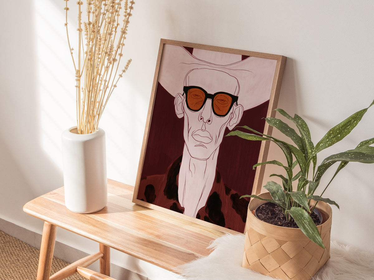 Cowboy Behind Shades Poster | Burgundy Red Illustrative Art Print | Western Gothic Wall Art — styled in an interior