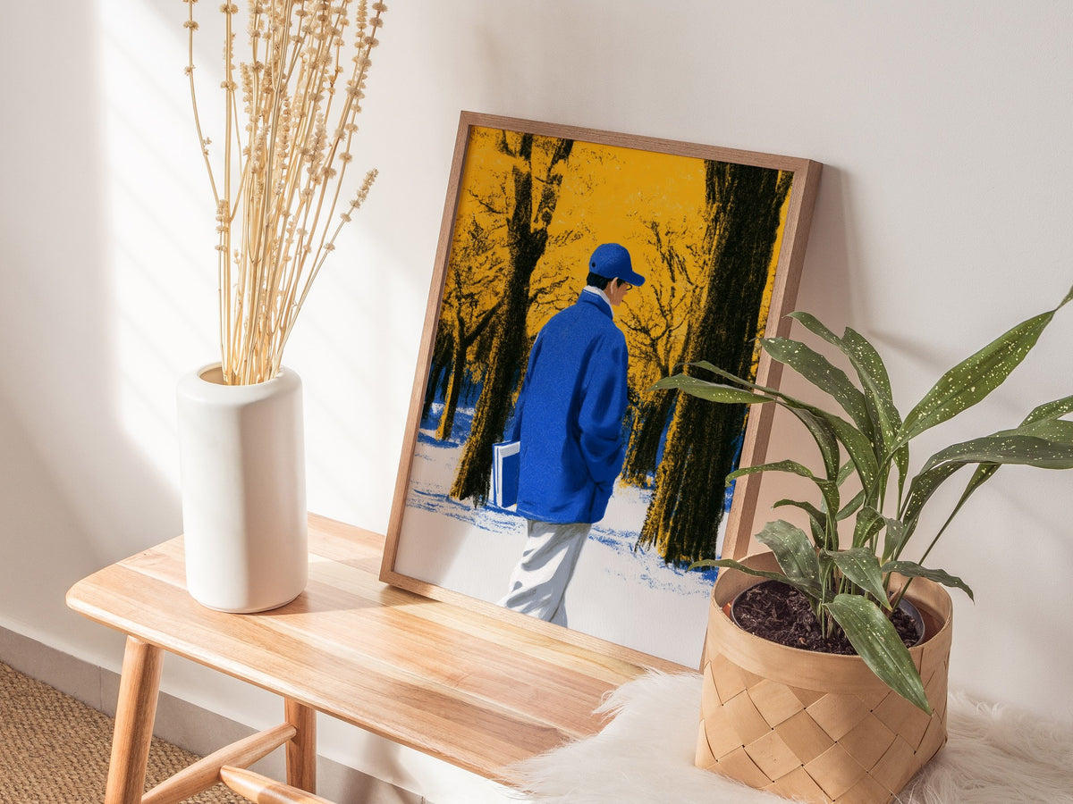 Reader Walks Blue Poster | Cobalt and Green Illustrative Art Print | Book Lovers Wall Art — styled in an interior