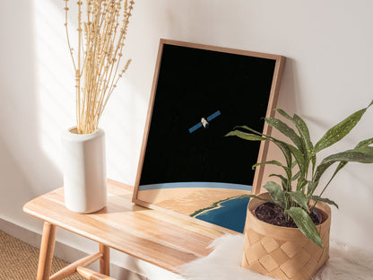Satellite Keeps Watch Poster | Blue and Tan Illustrative Art Print | Space Enthusiast Wall Art — styled in an interior