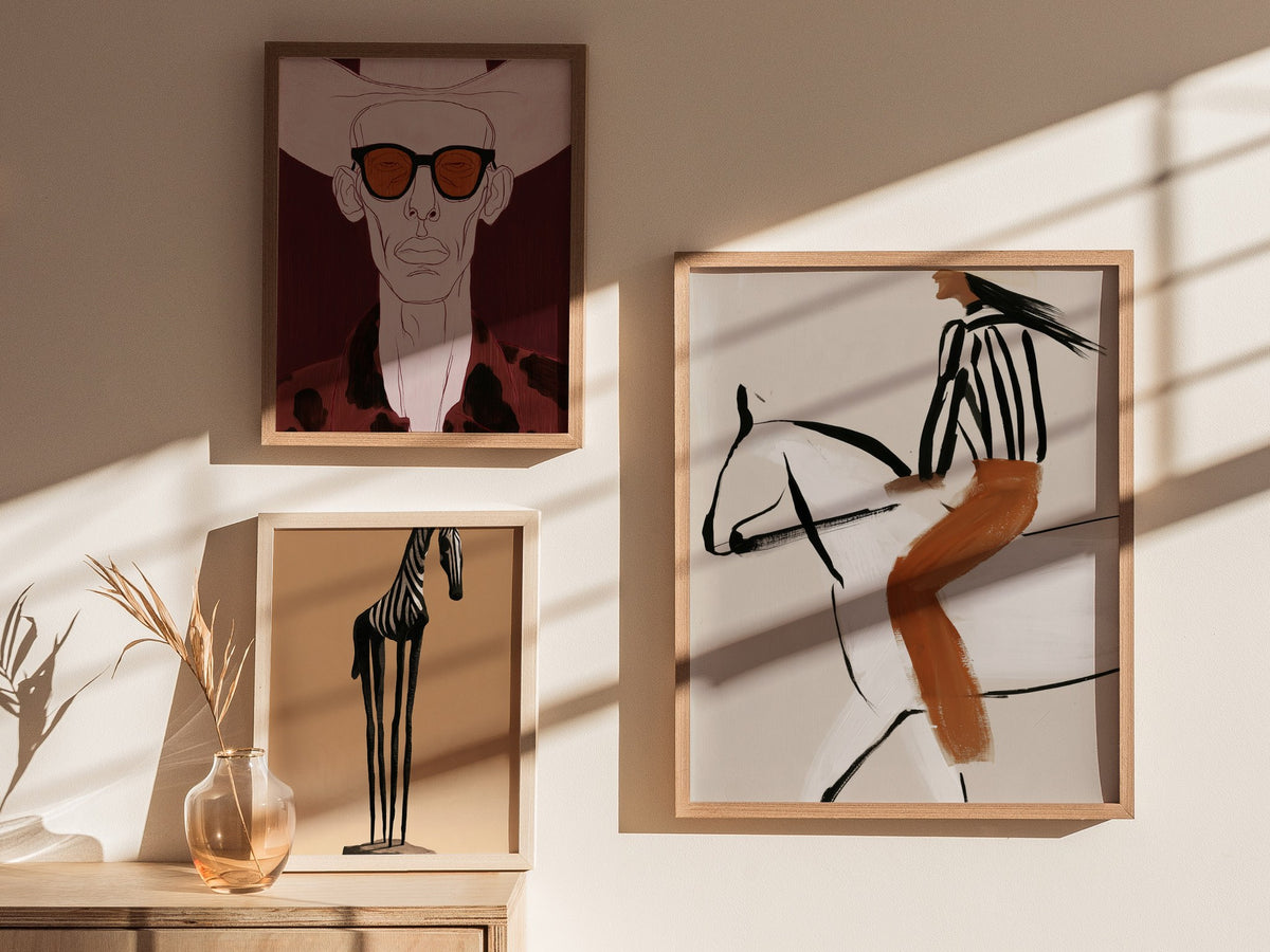 Rider Turns West Poster | Rust and Cream Illustrative Art Print | Western Wall Art — styled in an interior