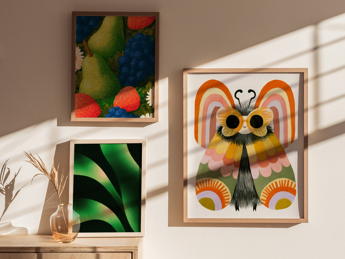 Moth Owns Rainbows Poster | Orange and Pink Illustrative Art Print | Kids Room Wall Art — styled in an interior