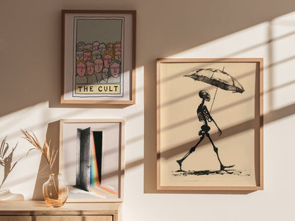 Skeleton with Umbrella Poster | Black and Cream Pen and Ink Art Print | Dark Humor Wall Art — styled in an interior