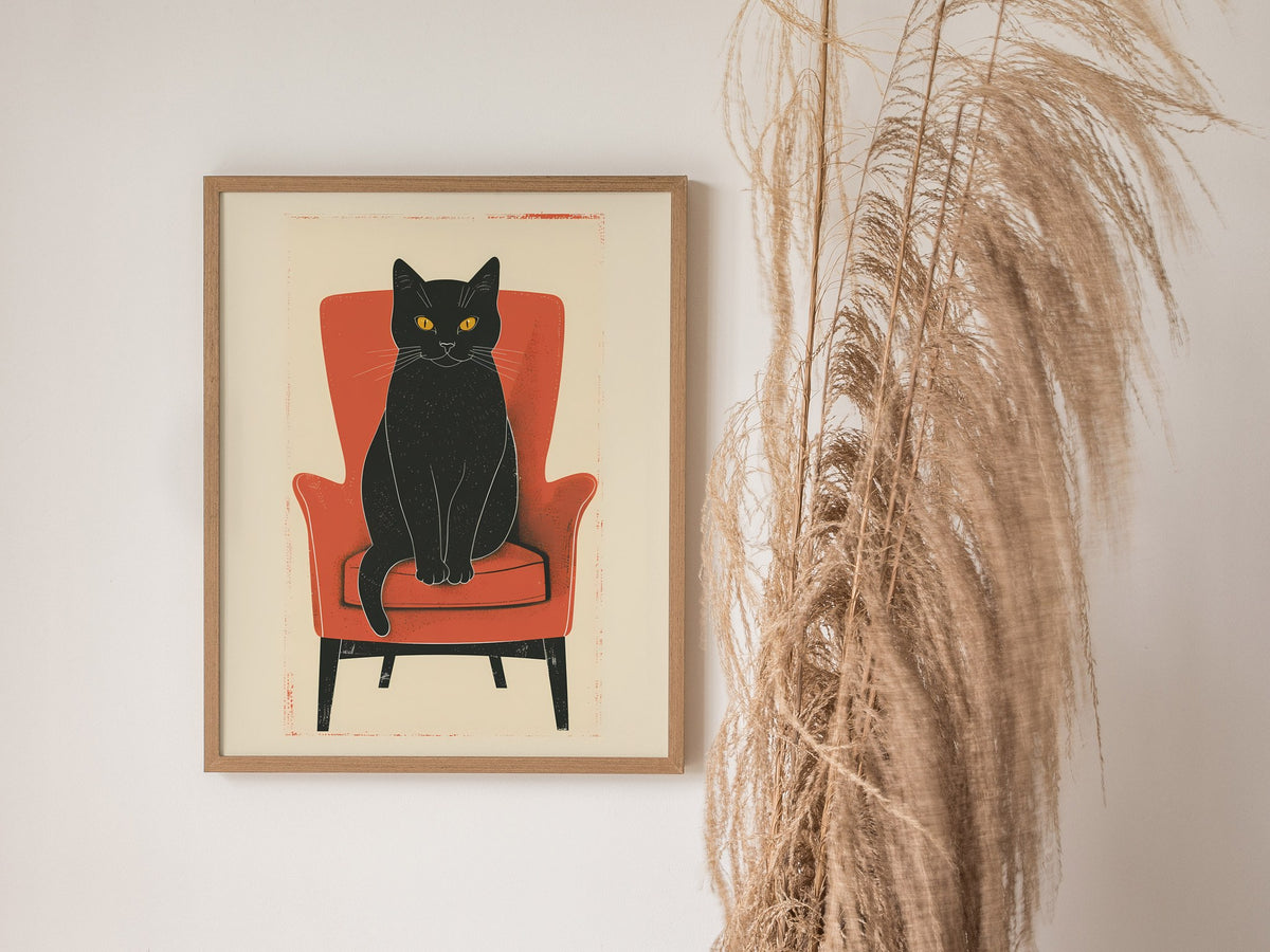 Black Cat in Red Chair Poster | Coral and Black Flat Design Art Print | Cat Lover Wall Art — styled in an interior