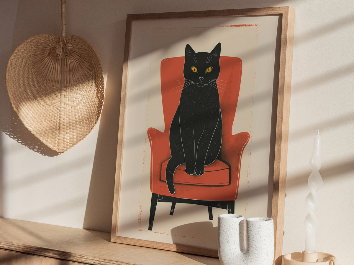 Black Cat in Red Chair Poster | Coral and Black Flat Design Art Print | Cat Lover Wall Art — styled in an interior