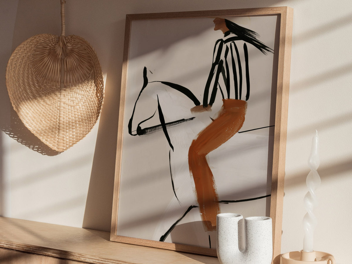Rider Turns West Poster | Rust and Cream Illustrative Art Print | Western Wall Art — styled in an interior