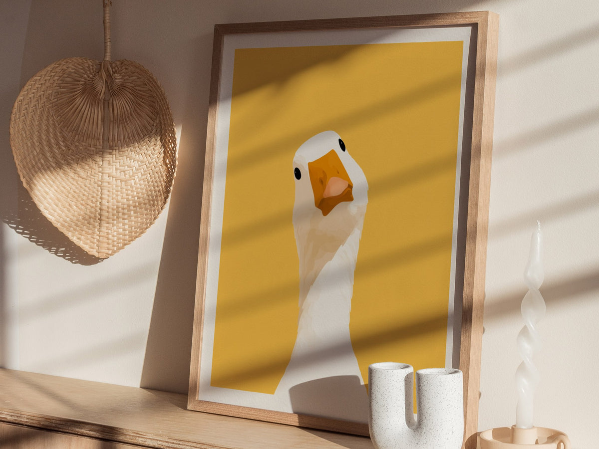 Goose Tilts Head Poster | White and Gold Flat Design Art Print | Kids Room Wall Art — styled in an interior