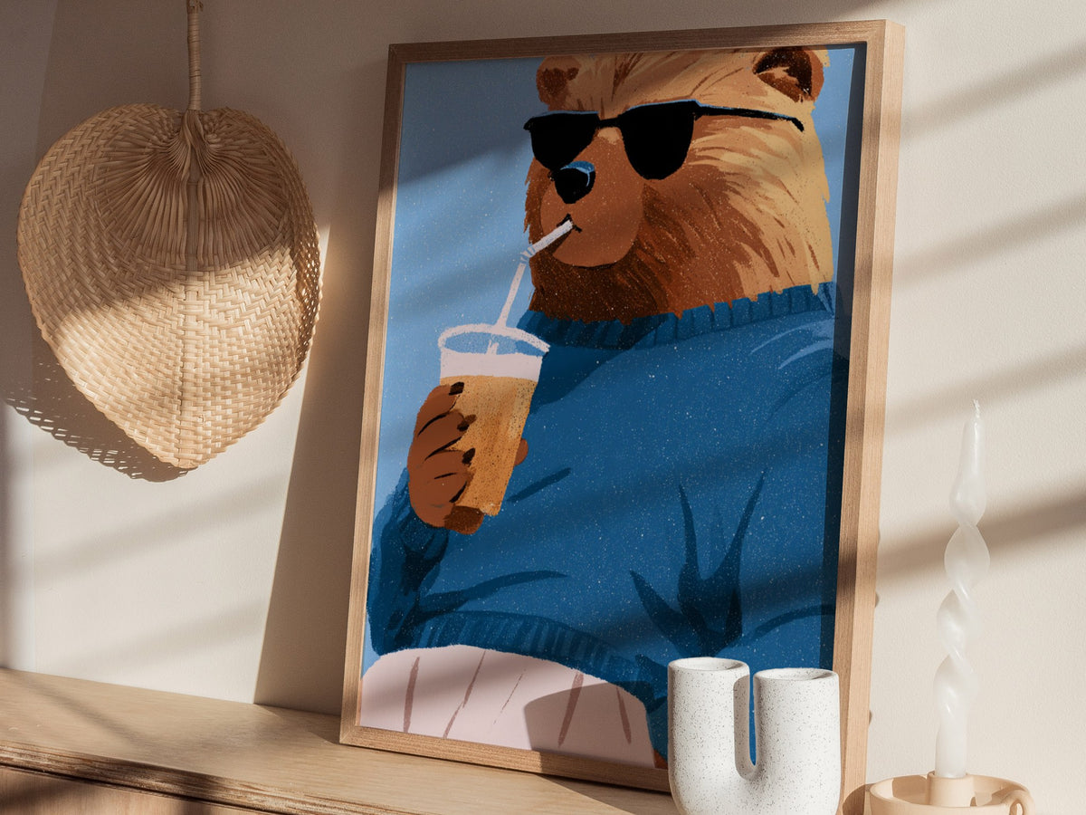 Cool Bear Sips Poster | Pastel Blue Illustrative Art Print | Kids Room Wall Art — styled in an interior