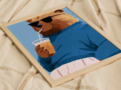 Cool Bear Sips Poster | Pastel Blue Illustrative Art Print | Kids Room Wall Art — styled in an interior