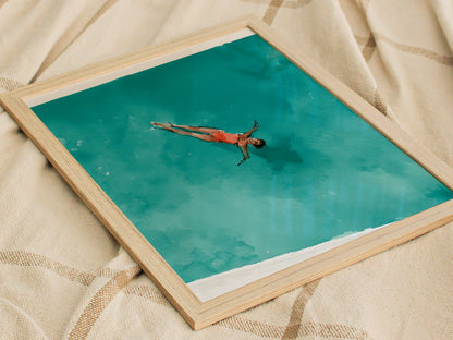 Swimmer in Pool Poster | Teal and Coral Watercolor Art Print | Spa Wall Art — styled in an interior