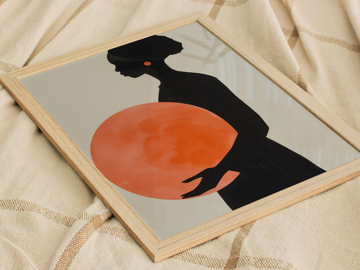 Woman with Orange Sphere Poster | Coral and Black Minimalism Art Print | Minimalist Wall Art — styled in an interior