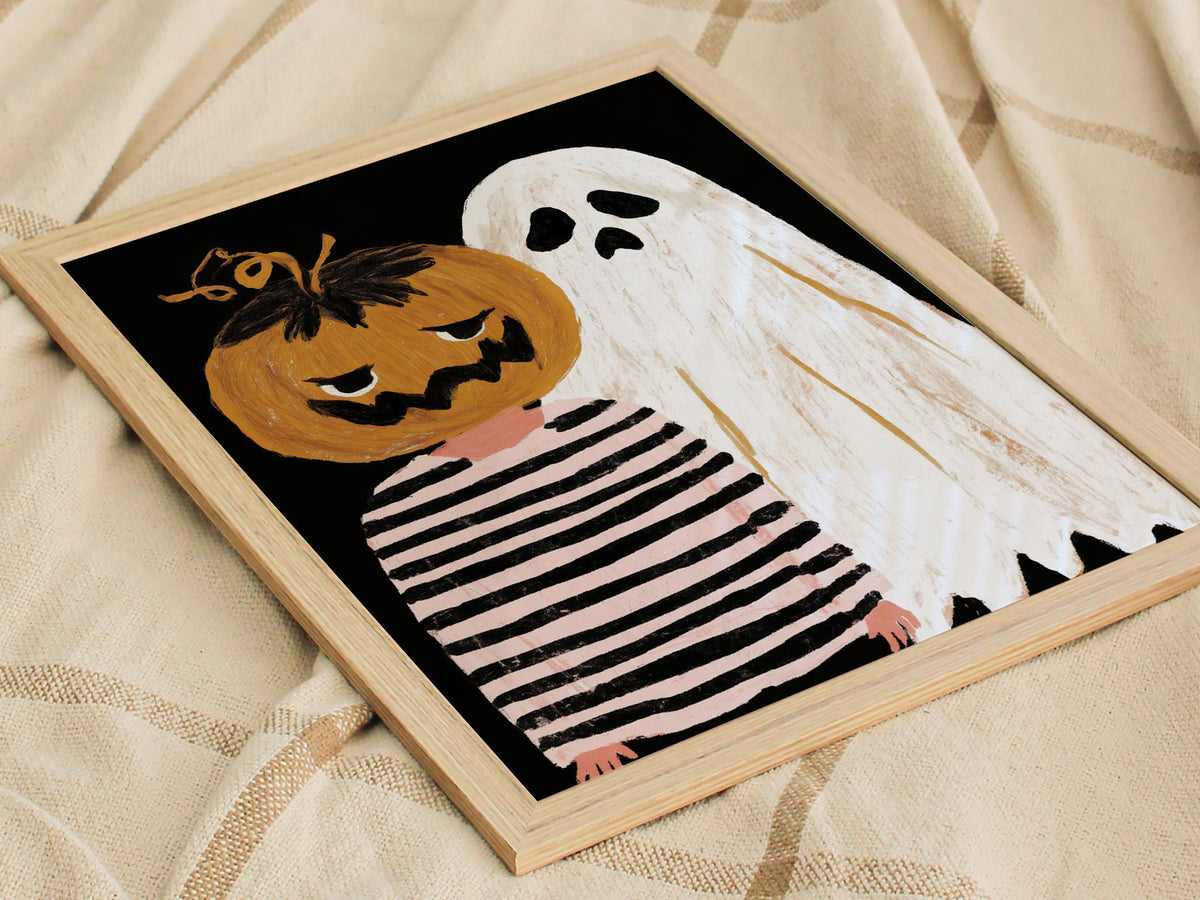 Pumpkin and Ghost Poster | Pink and Orange Illustrative Art Print | Kids Room Wall Art — styled in an interior
