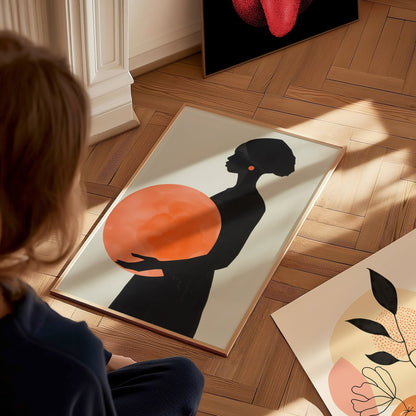 Woman with Orange Sphere Poster | Coral and Black Minimalism Art Print | Minimalist Wall Art — styled in an interior