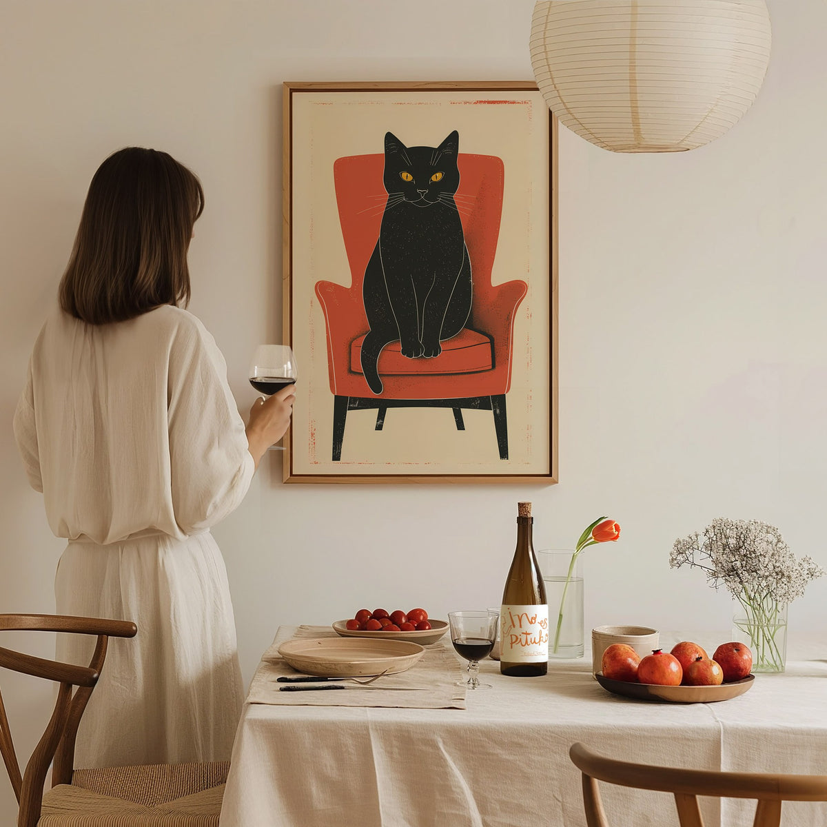 Black Cat in Red Chair Poster | Coral and Black Flat Design Art Print | Cat Lover Wall Art — styled in an interior
